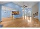 Open floor plan with hardwood floors connecting the living area and kitchen at 1607 Essex Hall Dr, Rock Hill, SC 29730