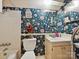 Bathroom showcasing floral wallpaper, bathtub and vanity at 208 Armstrong Dr, Belmont, NC 28012