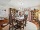 Dining room featuring a wooden table, chandelier, and classic furnishings at 208 Armstrong Dr, Belmont, NC 28012
