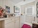 Bright laundry room with white cabinets, modern washer and dryer at 208 Armstrong Dr, Belmont, NC 28012