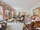 Spacious living room with elegant furniture, floral accents, and ample natural light at 208 Armstrong Dr, Belmont, NC 28012