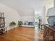 Spacious living room with hardwood floors, antique furniture and ample natural light at 208 Armstrong Dr, Belmont, NC 28012
