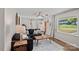 Bright living room featuring a cozy couch and large windows, creating an inviting space at 2113 Woodlawn St, Kannapolis, NC 28083