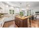 Beautiful kitchen with granite countertops, a central island, and modern appliances at 212 Seven Oaks Lndg, Belmont, NC 28012