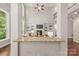 Great views of the home's living room showcasing the cozy fireplace and lighting at 212 Seven Oaks Lndg, Belmont, NC 28012