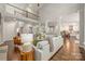 Bright living room boasts a high ceiling, hardwood floors and plenty of space to relax at 212 Seven Oaks Lndg, Belmont, NC 28012