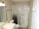 Bathroom featuring a vanity, mirror, toilet and shower at 214 Idlewood Dr, Kannapolis, NC 28083