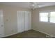 Bedroom with carpet, white walls and closet at 214 Idlewood Dr, Kannapolis, NC 28083
