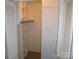 Walk-in closet with shelving and a light switch at 214 Idlewood Dr, Kannapolis, NC 28083