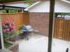 Private patio area with a grill and seating, perfect for outdoor dining and entertaining at 214 Idlewood Dr, Kannapolis, NC 28083