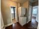 Laundry room area features stackable washer and dryer at 2434 Columbus Cir, Charlotte, NC 28208