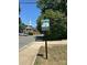 Camp Greene Historic sign with a church in the background on a sunny day at 2434 Columbus Cir, Charlotte, NC 28208