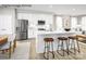 Modern kitchen with stainless steel appliances, white cabinets, and a large center island at 2520 Ellen Ave # 1001C, Charlotte, NC 28208