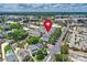Aerial view showcasing townhomes with nearby cityscape in the background, marked by a pin at 258 Iverson Way, Charlotte, NC 28203