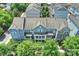 Aerial view of multi-story townhomes with lush landscaping, offering scenic community living at 258 Iverson Way, Charlotte, NC 28203