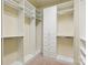 Spacious walk-in closet with custom shelving and ample storage space at 258 Iverson Way, Charlotte, NC 28203