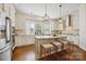 Modern kitchen with stainless steel appliances, granite countertops, and a center island with seating at 258 Iverson Way, Charlotte, NC 28203