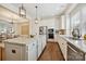 Modern kitchen with granite countertops, stainless steel appliances and an island with seating at 258 Iverson Way, Charlotte, NC 28203
