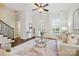 Bright living room with hardwood floors, neutral decor, and ample natural light at 258 Iverson Way, Charlotte, NC 28203