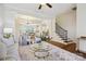 Open-concept living space with seamless flow to the kitchen and dining area at 258 Iverson Way, Charlotte, NC 28203