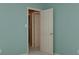 Light-filled bedroom features neutral walls, plush carpet and bright white trim and doors at 2825 Redfield Dr, Charlotte, NC 28270