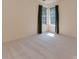 Spacious bedroom with lots of natural light coming in from large windows at 2825 Redfield Dr, Charlotte, NC 28270