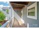 Balcony on house with wood floors. The Balcony has a wooden door at 300 E Park Ave # 16, Charlotte, NC 28203