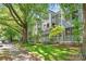 Charming townhomes with well-manicured lawns and lush landscaping; a true neighborhood gem at 300 E Park Ave # 16, Charlotte, NC 28203