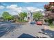 This exterior view shows convenient parking and well-maintained landscaping at 300 E Park Ave # 16, Charlotte, NC 28203
