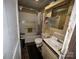A full bathroom with standard fixtures including a tub and shower in need of remodeling at 302 Melrose Sw Dr, Concord, NC 28025