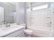This bathroom features a marble vanity and a tub with white tile surround at 3073 Oliver Stanley Trl, Lancaster, SC 29720