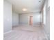 Spacious bedroom with plush carpeting, neutral paint, and ample natural light at 3073 Oliver Stanley Trl, Lancaster, SC 29720