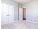 This bedroom features neutral carpeting, a closet and an ensuite bathroom at 3073 Oliver Stanley Trl, Lancaster, SC 29720