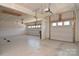 This spacious three car garage has epoxy floors and lots of room for storage at 3073 Oliver Stanley Trl, Lancaster, SC 29720