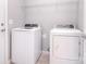The laundry room features a full size washer and dryer, and wire shelving at 3073 Oliver Stanley Trl, Lancaster, SC 29720