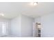 Neutral living room with ample natural light, a ceiling fan and doorway to other rooms at 3073 Oliver Stanley Trl, Lancaster, SC 29720