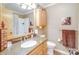 Bathroom features a granite countertop vanity, decorative mirror and shower-tub combination at 3116 Old Montgomery Place Rd, Monroe, NC 28112
