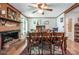 Inviting dining room with a fireplace, hardwood floors, and ample seating at 3116 Old Montgomery Place Rd, Monroe, NC 28112