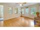 Light-filled living room boasts hardwood floors, neutral paint, and ample natural light at 3116 Old Montgomery Place Rd, Monroe, NC 28112
