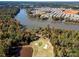 Aerial view of community featuring a golf course, lake access and dock at 31226 Cove View Ct, Lancaster, SC 29720