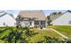 Backyard featuring a screened in porch and a well manicured lawn at 31226 Cove View Ct, Lancaster, SC 29720