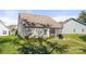 Backyard featuring a screened in porch and a well manicured lawn at 31226 Cove View Ct, Lancaster, SC 29720