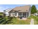View of the level backyard with the screened porch and patio at 31226 Cove View Ct, Lancaster, SC 29720