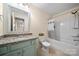 Neutral bathroom with granite countertop, modern lighting, and bath and shower combo at 31226 Cove View Ct, Lancaster, SC 29720