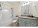 Cozy full bathroom featuring a bath tub, shower, and neutral tiling at 31226 Cove View Ct, Lancaster, SC 29720