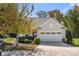 Charming single-story home with a well-maintained front yard and a two-car garage, perfect for suburban living at 31226 Cove View Ct, Lancaster, SC 29720