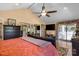 Bright primary bedroom with vaulted ceiling, hardwood floors, ceiling fan and natural light at 370 Shiloh Rd, Statesville, NC 28677