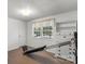 Bedroom featuring exercise equipment, large window and neutral color scheme at 370 Shiloh Rd, Statesville, NC 28677