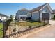 Well-maintained backyard with a fenced-in area, a fire pit, and an outdoor dining set, perfect for entertaining at 371 Luray Way, Rock Hill, SC 29730