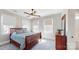 Comfortable bedroom featuring a wood bed frame, lots of natural light, and neutral color palette at 371 Luray Way, Rock Hill, SC 29730